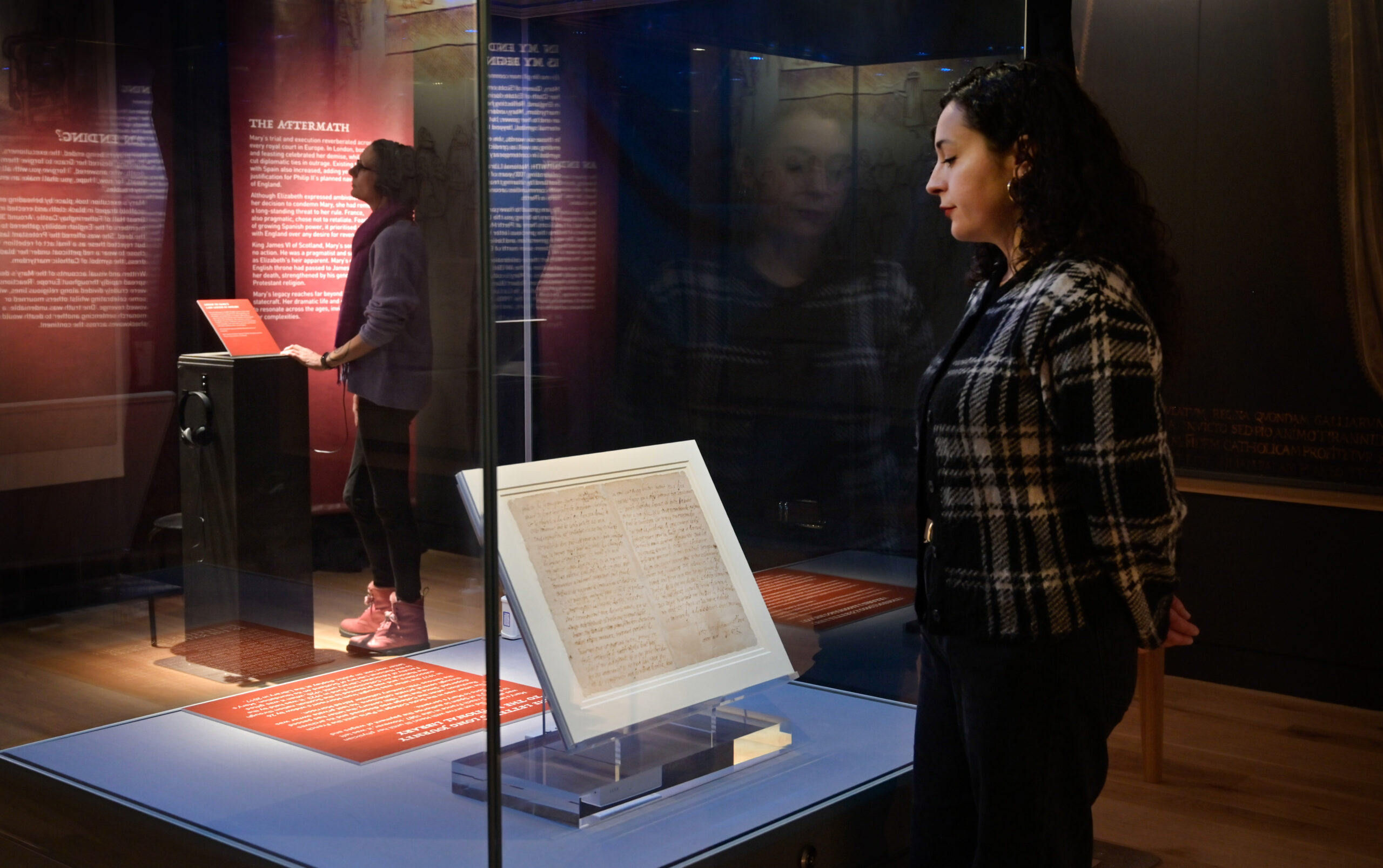 A visitor observes the Last Letter on display at Perth Museum